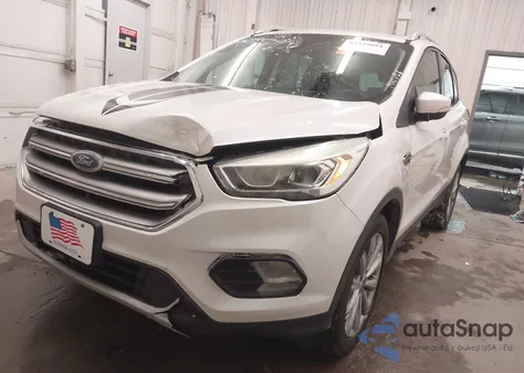 2017 Ford Escape Titanium z USA, uszkodzony, nr VIN 1FMCU9JD2HUB56161